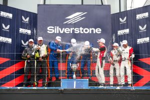 Signature RV on the top step podium